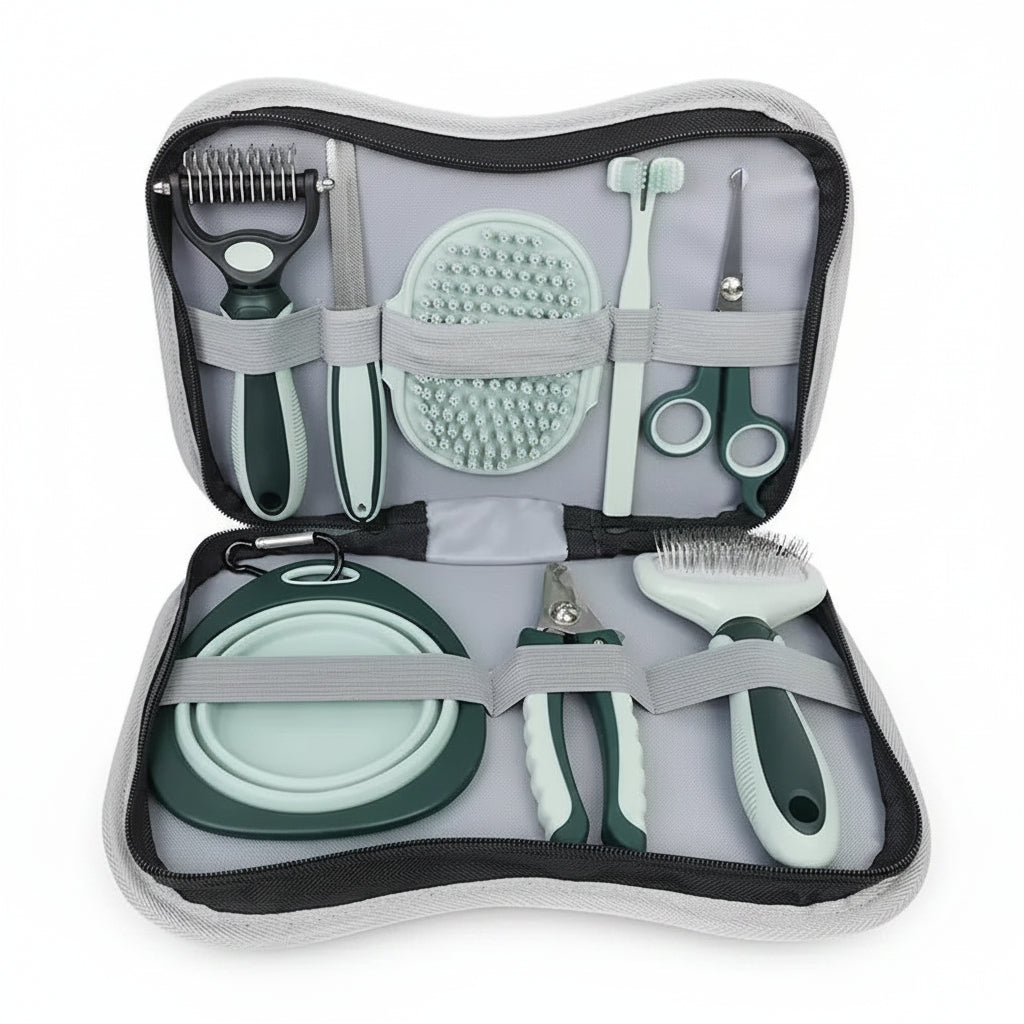 Set of grooming tools for pets in a travel case on a white background