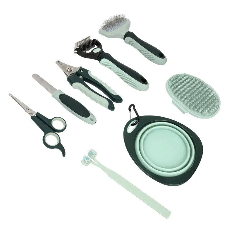 Set of pet grooming tools including scissors, brush, and nail clippers on a white background