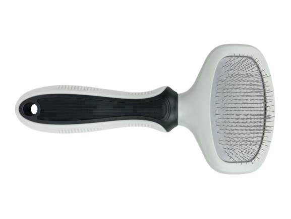 Pet grooming brush with black handle and white bristle head on a white background