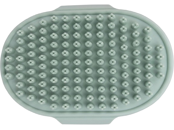Green silicone scrubber with raised surface on a white background